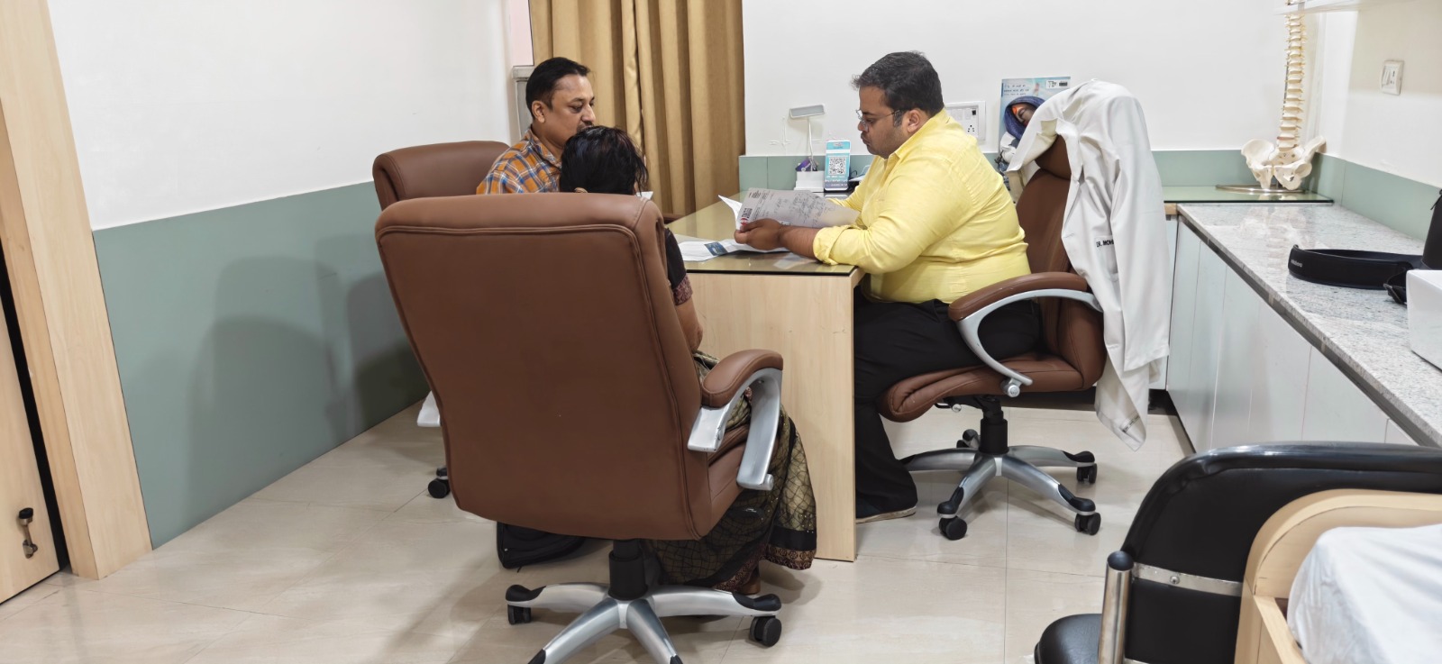 Clinic page hero with teal-blue gradient and rounded cards